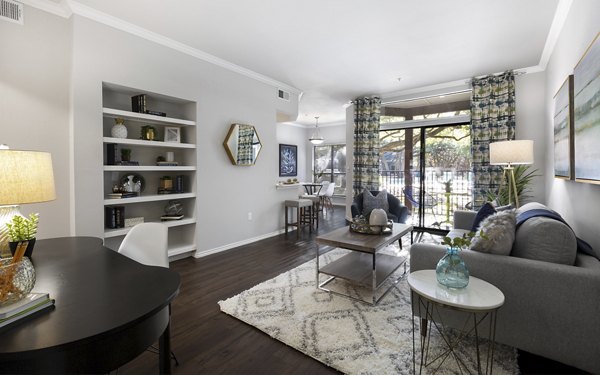 Spacious living room with modern decor in Hardrock Canyon Apartments