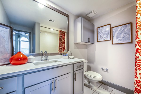 Bathroom featuring modern fixtures and elegant design at Manchester State Thomas Apartments