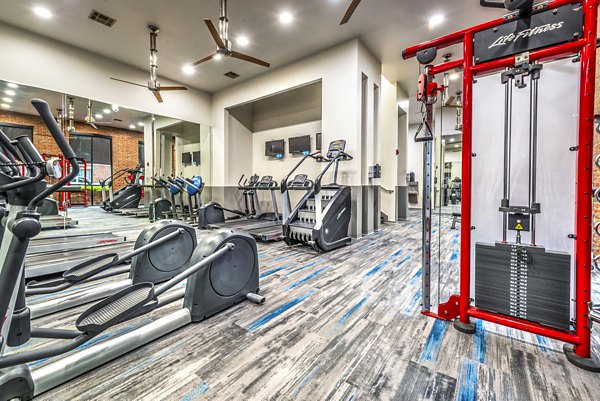 fitness center at Manchester State Thomas Apartments