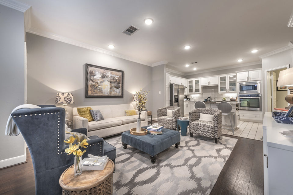 Spacious living room with modern decor in Manchester State Thomas Apartments