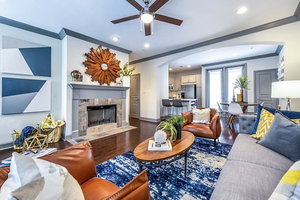 Spacious living room with modern furnishings in Manchester State Thomas Apartments