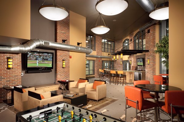 Clubhouse featuring modern design and cozy seating at 70 Capitol Yards Apartments in Washington, DC
