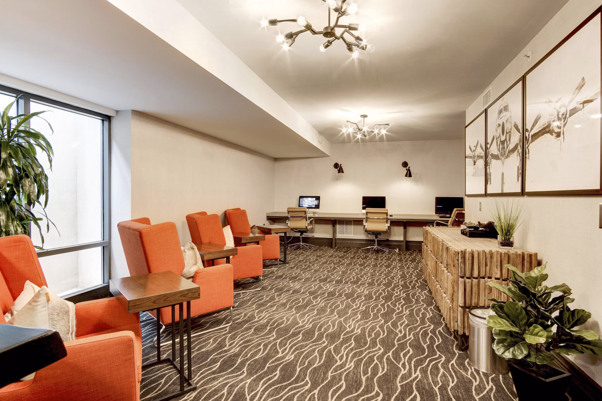 Modern business center with coworking spaces at 70 Capitol Yards Apartments, offering a sleek environment for remote work and productivity