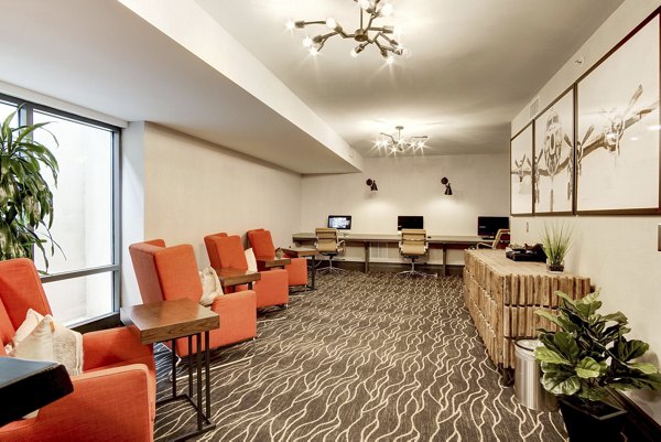 Modern business center with coworking spaces at 70 Capitol Yards Apartments, offering a sleek environment for remote work and productivity