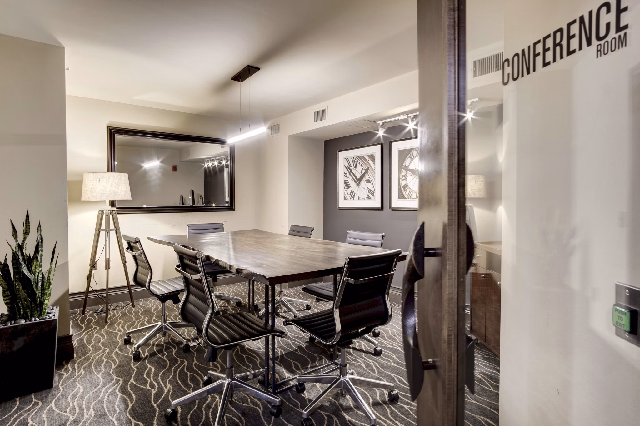 Modern meeting facility with sleek seating and presentation equipment at 70 Capitol Yards Apartments
