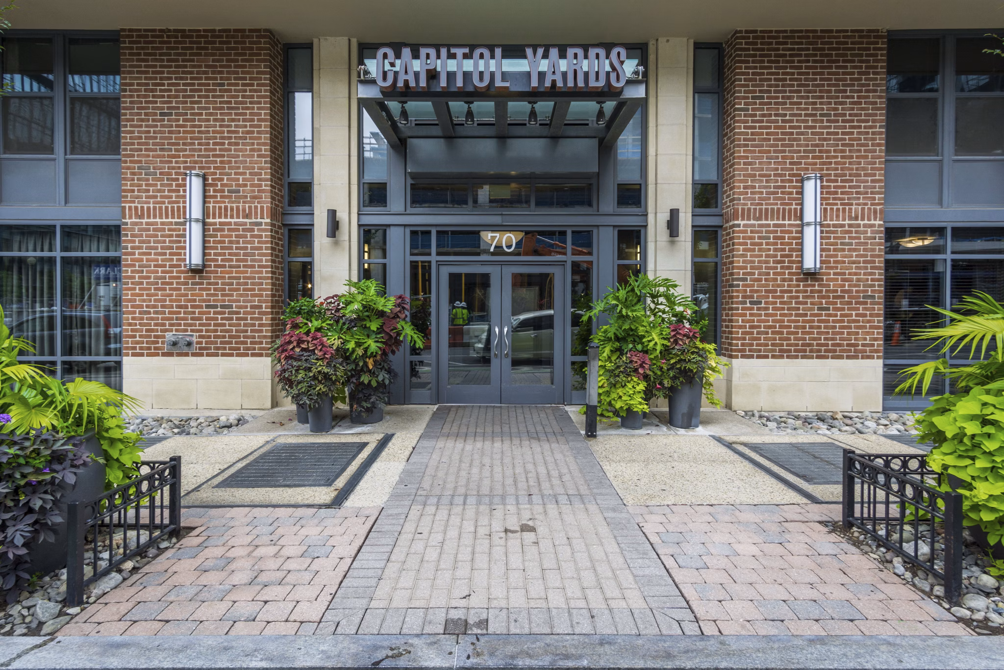 Clubhouse featuring luxurious dÃ©cor and seating at 70 Capitol Yards Apartments