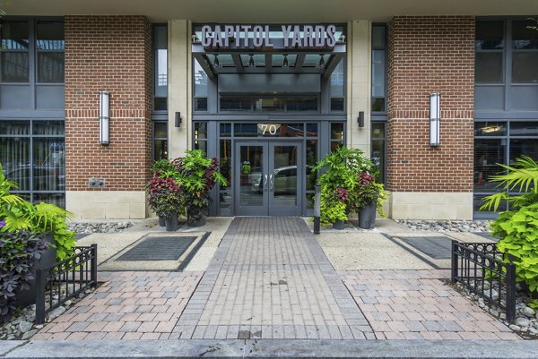 Clubhouse featuring luxurious dÃ©cor and seating at 70 Capitol Yards Apartments