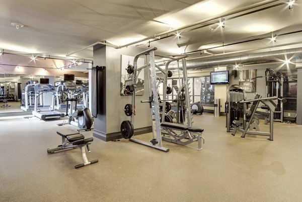 State-of-the-art fitness center with modern equipment at 70 Capitol Yards Apartments, ideal for active urban living