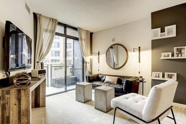 Spacious living room with modern decor at 70 Capitol Yards Apartments