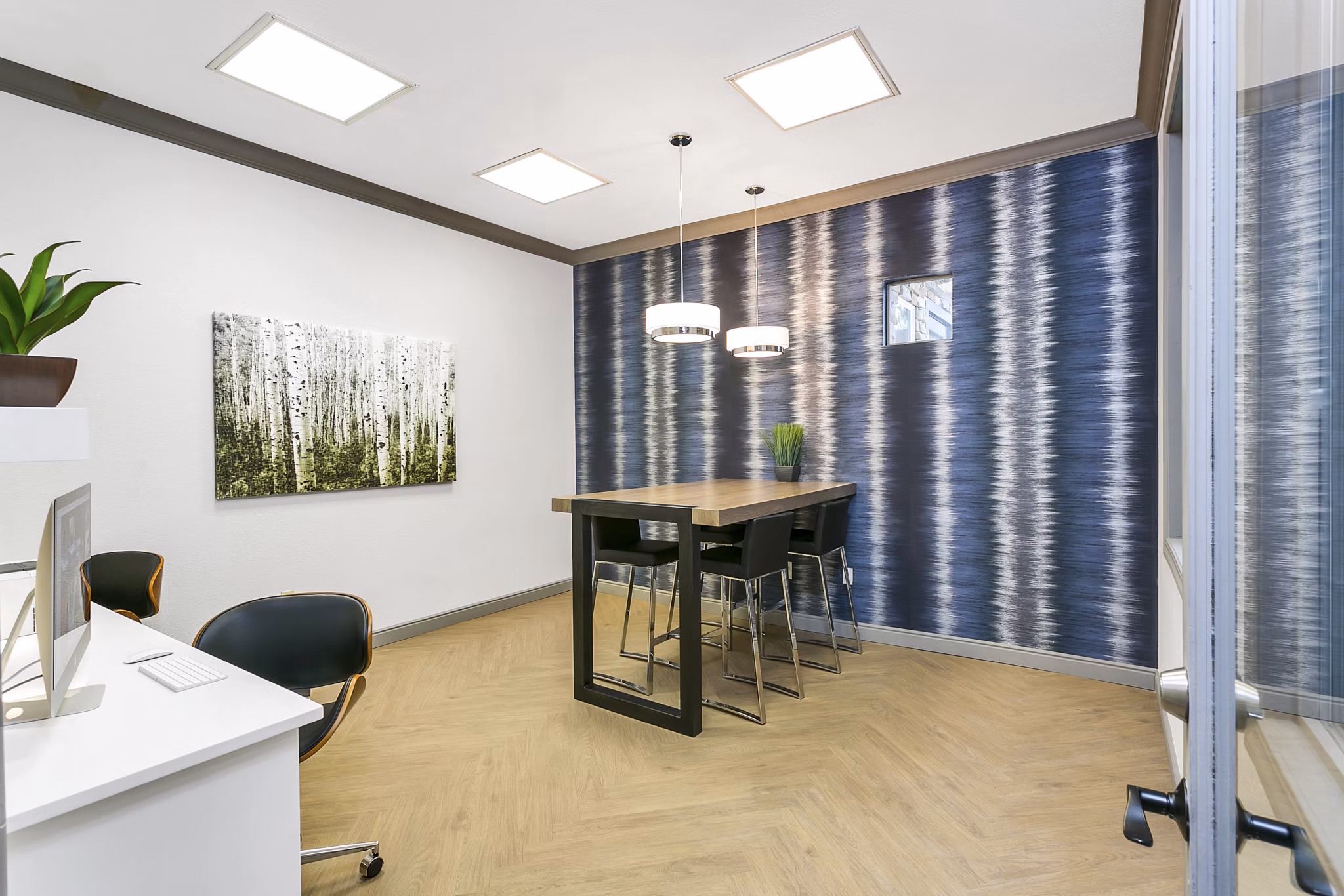 Executive business center with modern workstations at Creekside at Highlands Ranch Apartments