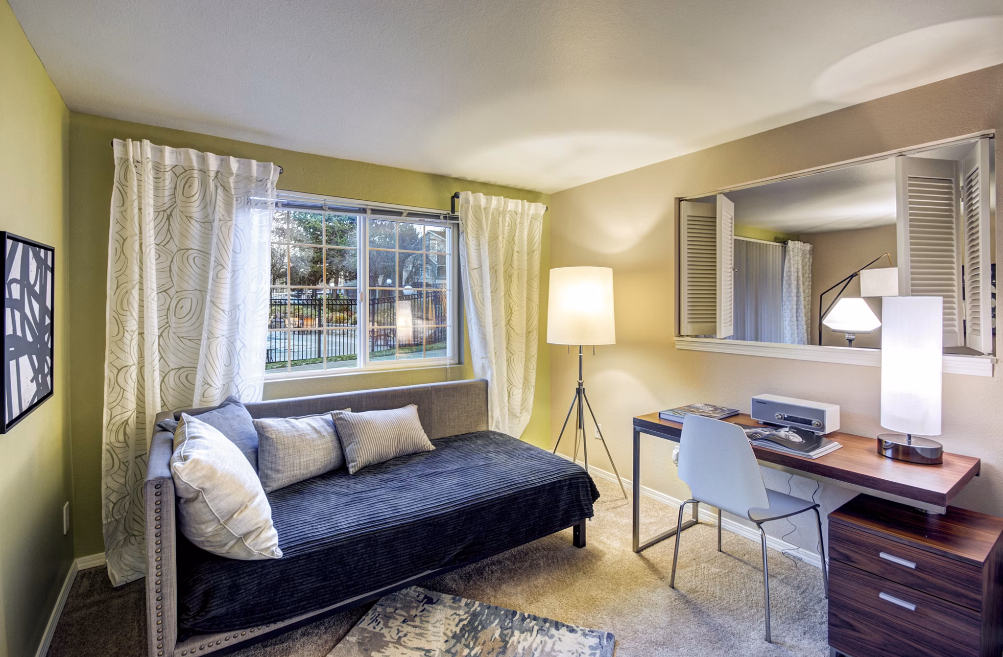 Elegant bedroom with large windows and modern decor in Bay Court at Harbour Pointe Apartments, ideal for luxury living