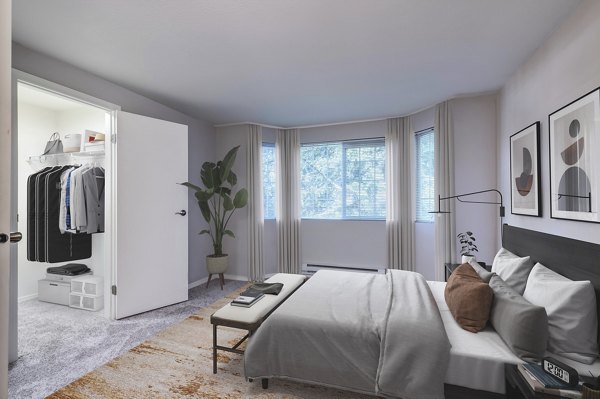 Comfortable bedroom with modern decor at Bay Court at Harbour Pointe Apartments