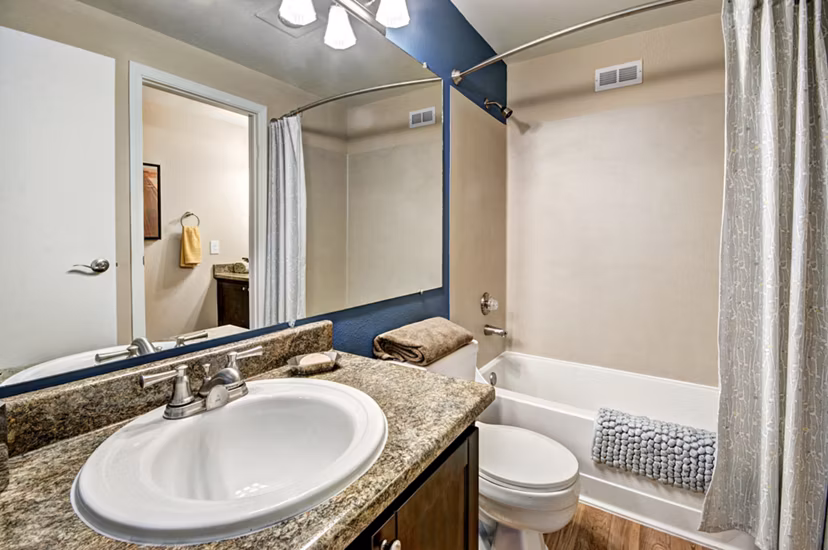 Modern bathroom with sleek fixtures in Bay Court at Harbour Pointe Apartments