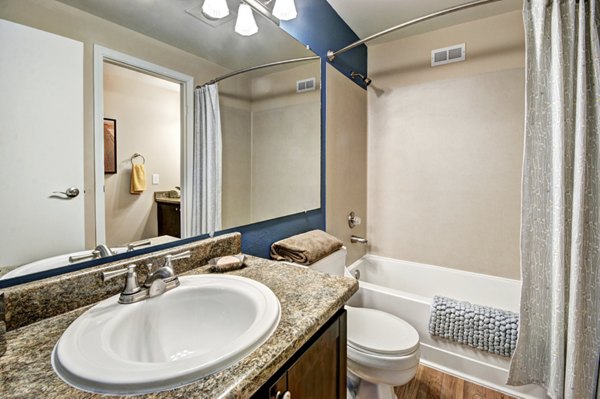 Modern bathroom with sleek fixtures in Bay Court at Harbour Pointe Apartments