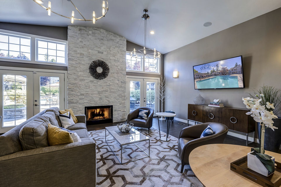 Clubhouse featuring modern design and comfortable seating at Bay Court at Harbour Pointe Apartments