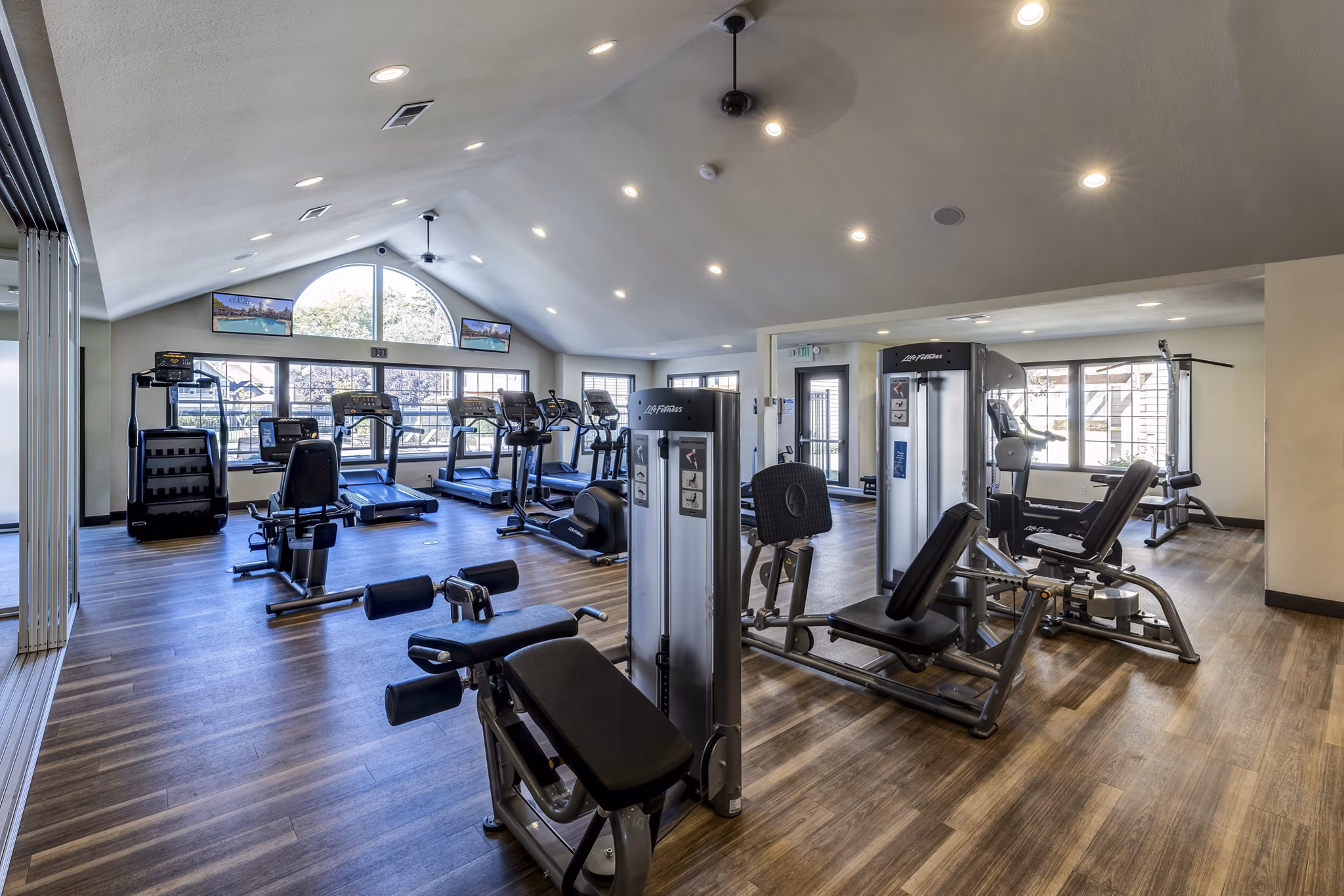 State-of-the-art fitness center with modern equipment at Bay Court at Harbour Pointe Apartments