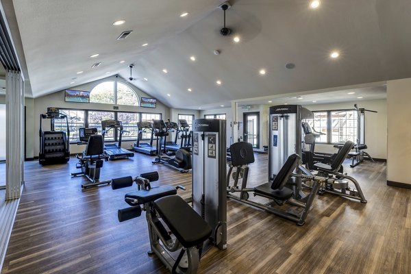 State-of-the-art fitness center with modern equipment at Bay Court at Harbour Pointe Apartments