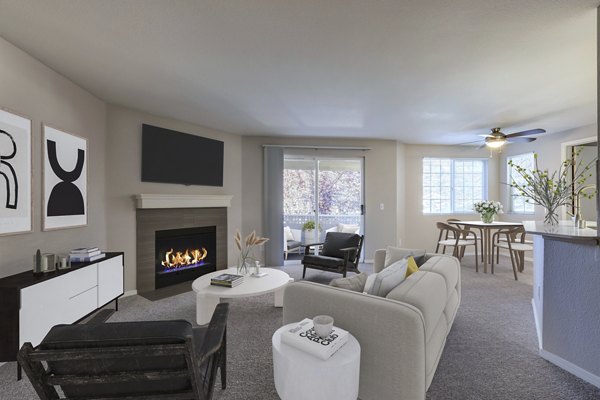 Spacious living room with modern furnishings in Bay Court at Harbour Pointe Apartments
