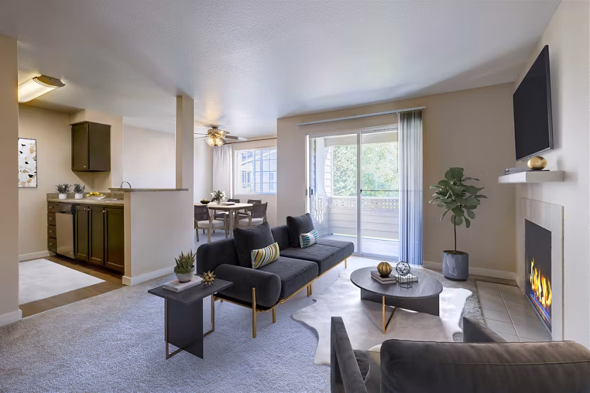 Spacious living room with modern furnishings at Bay Court at Harbour Pointe Apartments