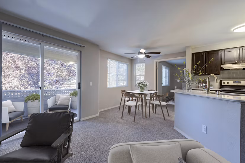 Spacious living room with modern furnishings at Bay Court at Harbour Pointe Apartments