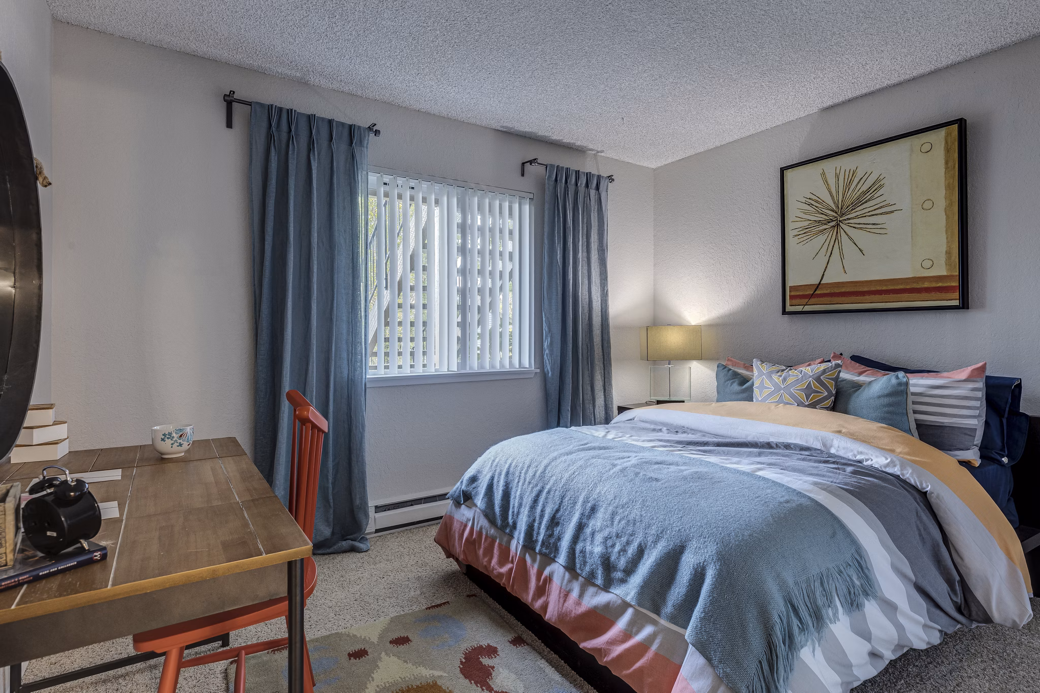 Cozy bedroom with modern decor in The Berkshire Apartments