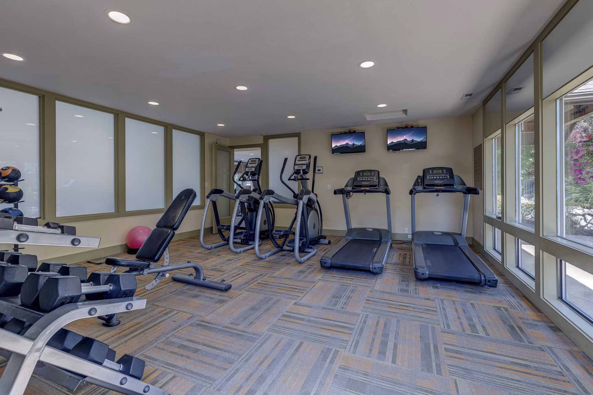 State-of-the-art fitness center with modern equipment at The Berkshire Apartments
