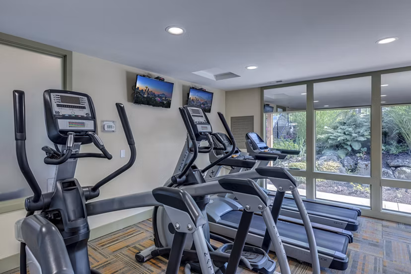Modern fitness center with state-of-the-art equipment at The Berkshire Apartments