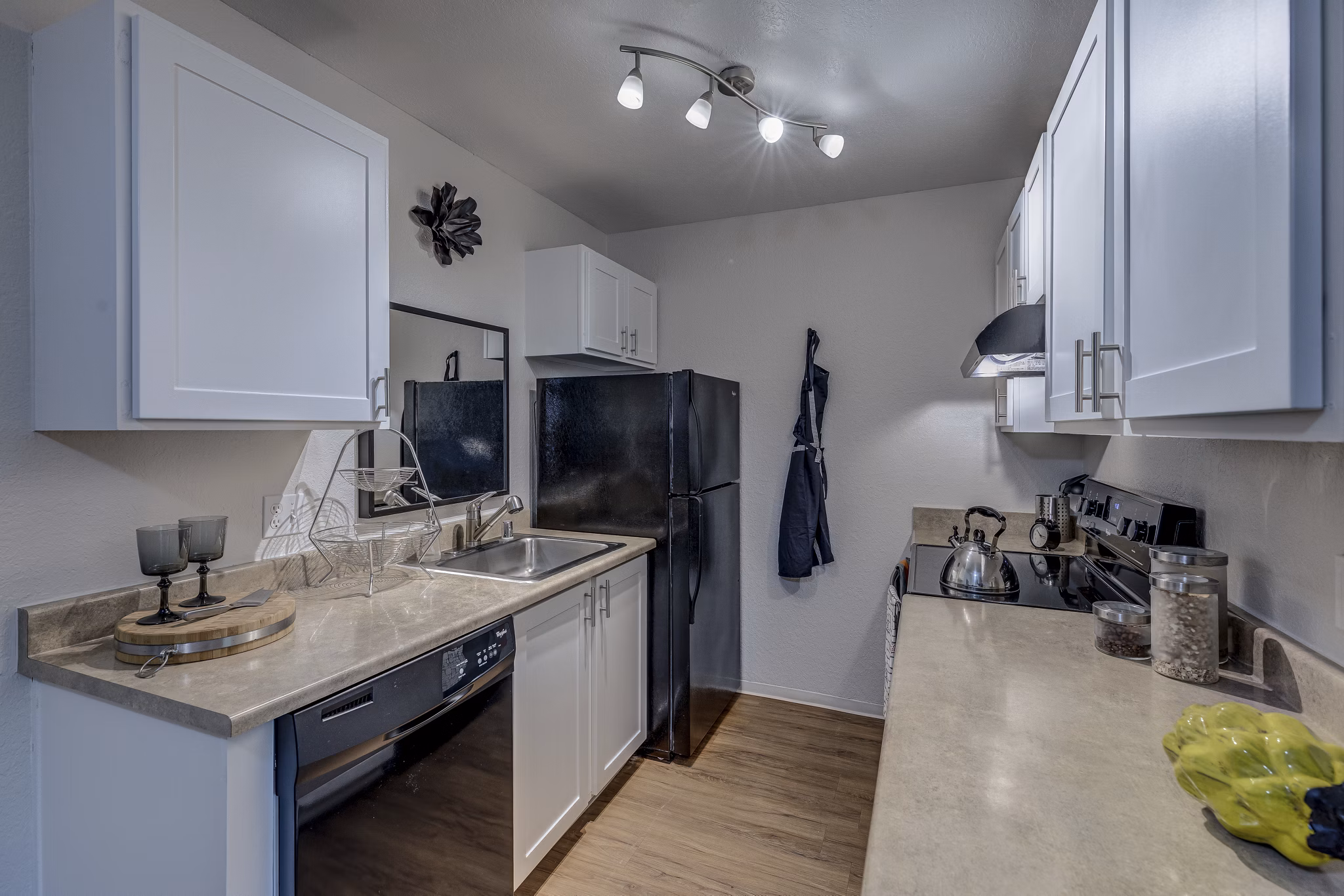 Modern kitchen with stainless steel appliances at The Berkshire Apartments