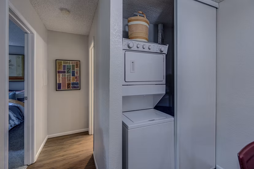 Laundry room with energy-efficient washers and dryers at The Berkshire Apartments