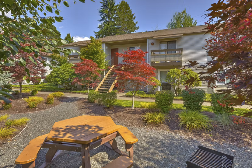 Courtyard with lush landscaping at The Berkshire Apartments featuring luxury living spaces