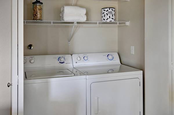laundry room at The Hills of Corona Apartments