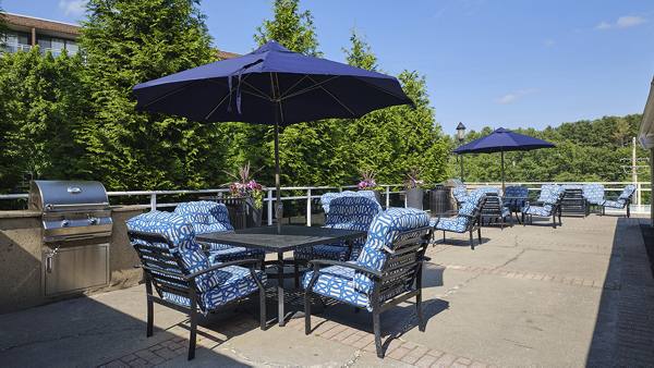 grill area at The Green at 9&90 Apartments