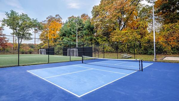 tennis court at The Green at 9&90 Apartments