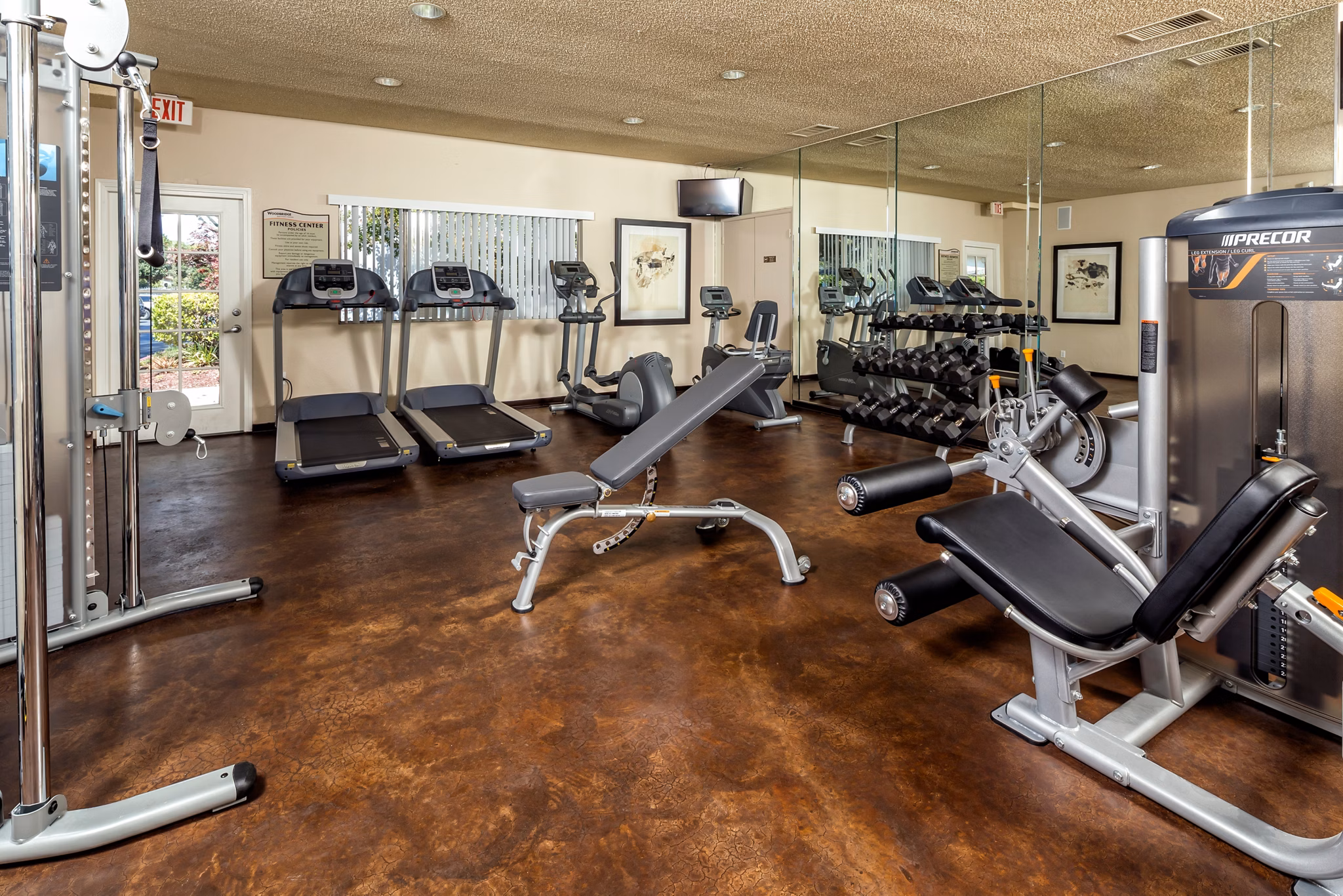 State-of-the-art fitness center with modern equipment at Eagle Gate Apartments