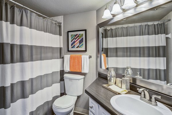 Modern bathroom with elegant fixtures at Stratford Station Apartments