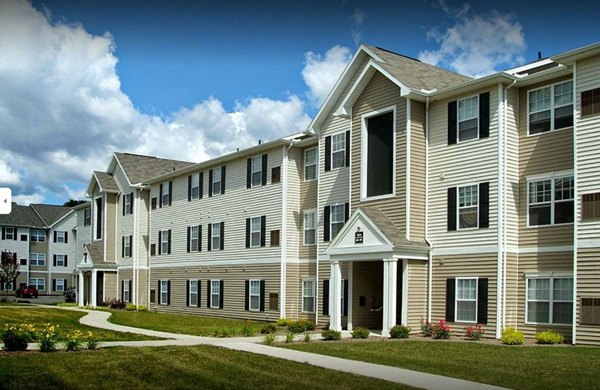Campus Pointe Apartments: Luxury view at Campus Pointe Apartments showcasing modern architecture and lush landscaping in a vibrant neighborhood