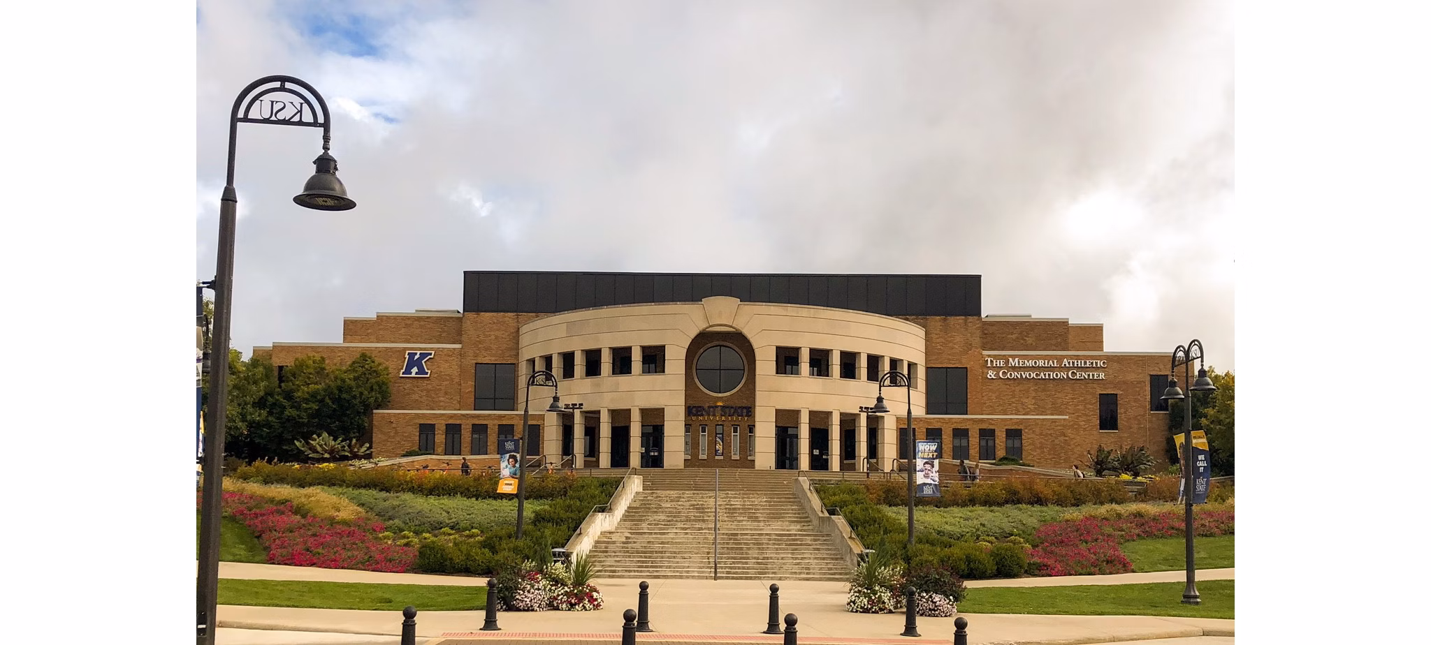 Campus Pointe Apartments: Lush green neighborhood views with tree-lined walkways