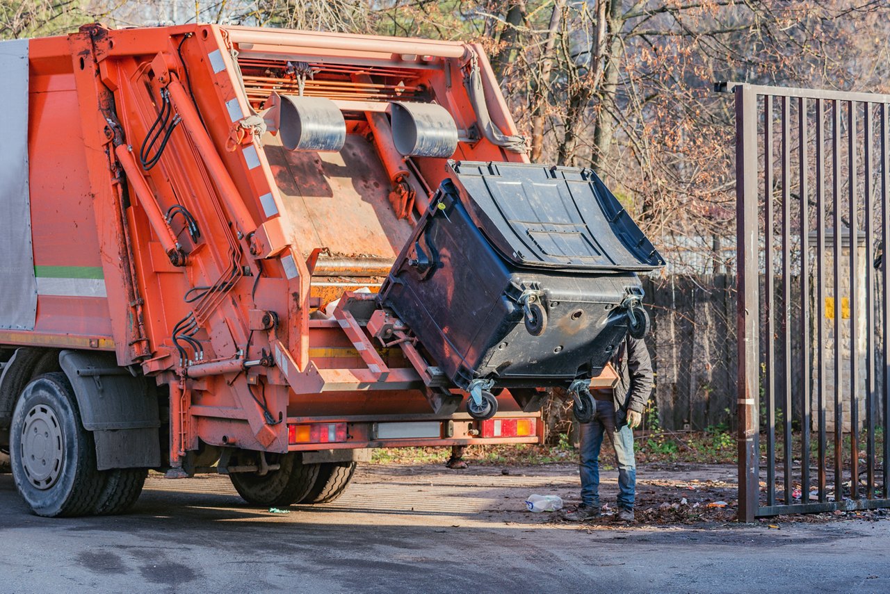 Process of garbage loading to the garbage truck.