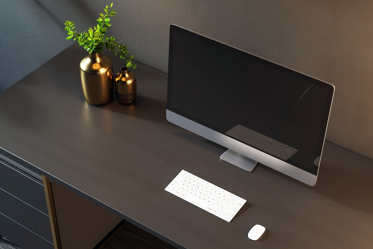 Minimalist computer setup on a dark wooden desk with a sleek screen, keyboard, and mouse, complemented by golden vases and greenery indoors. 3D Rendering.