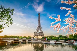 Paris Eiffel Tower and river Seine with sunrise in Paris, France. Eiffel Tower is one of the most iconic landmarks of Paris, web banner format ar early spring morning