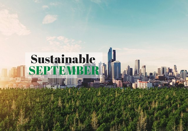 A skyline of a city with a large green forest in the foreground, overlaid with the text 'Sustainable September'.