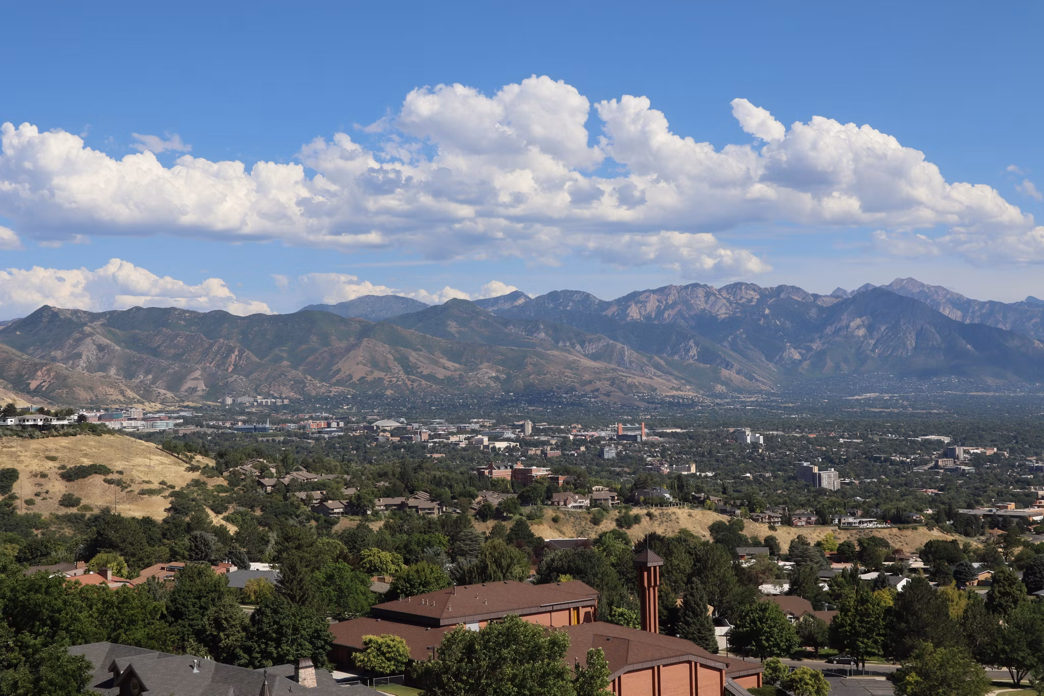 A beautiful mountain range surrounding Salt Lake City on a sunny day, Utah