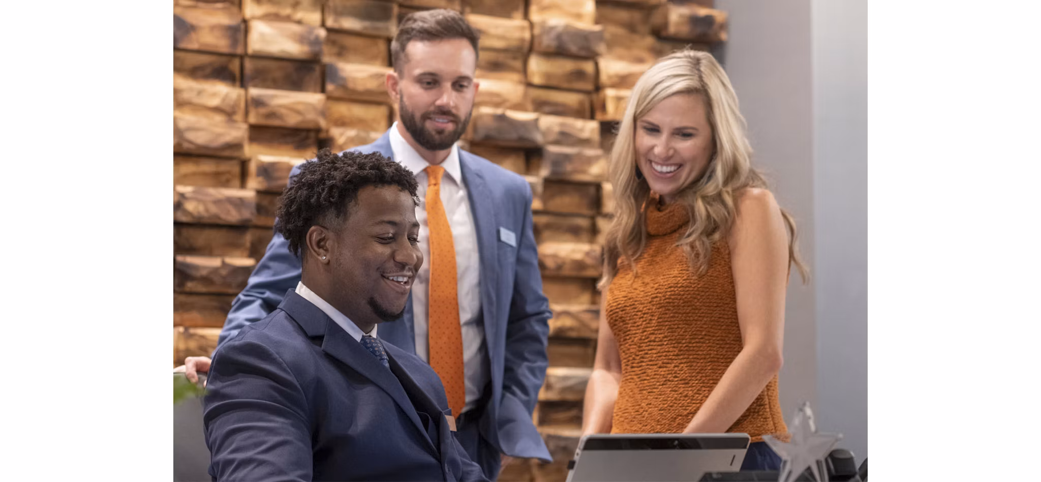 Greystar Team members looking at the same computer | Blog | Greystar