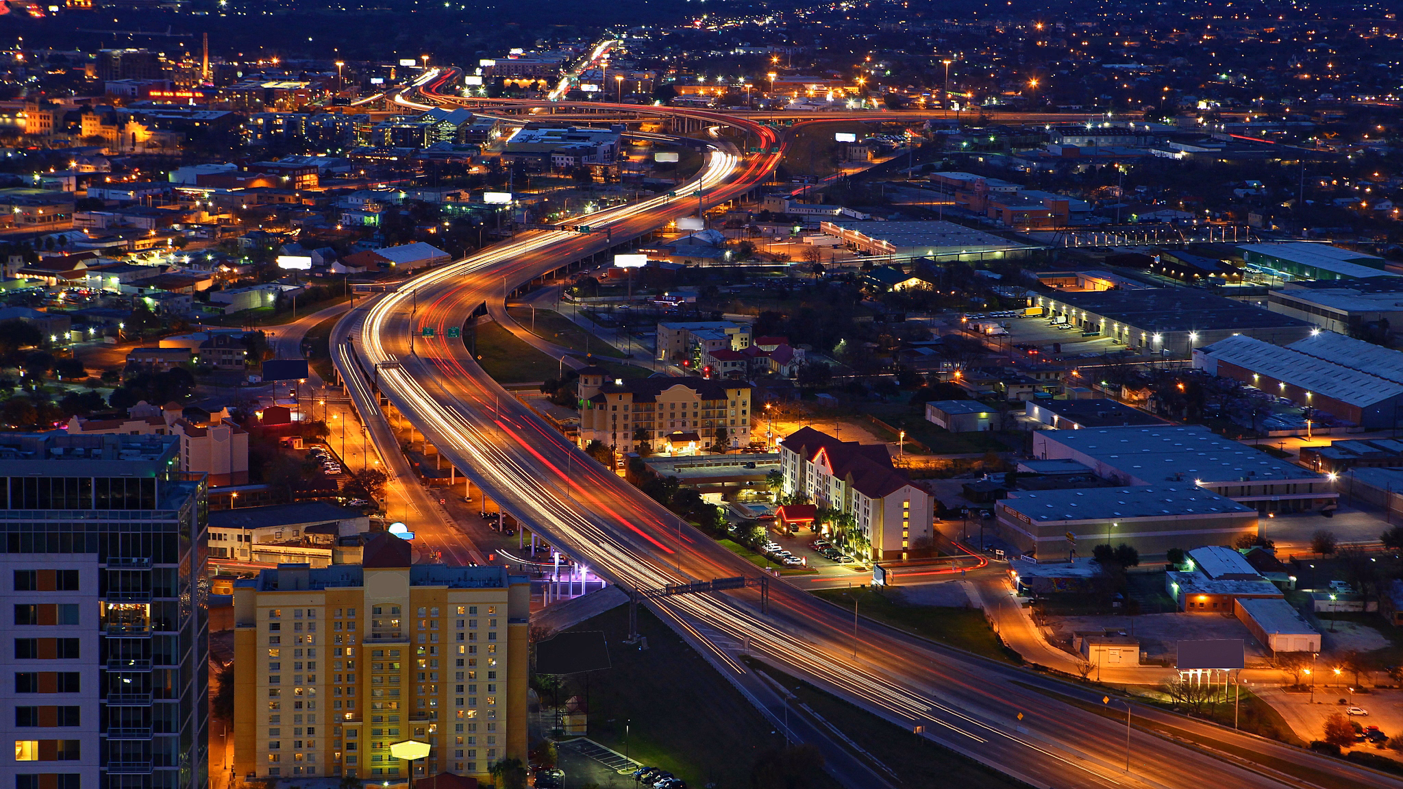 An aerial of San Antonio, Texas expressways at night