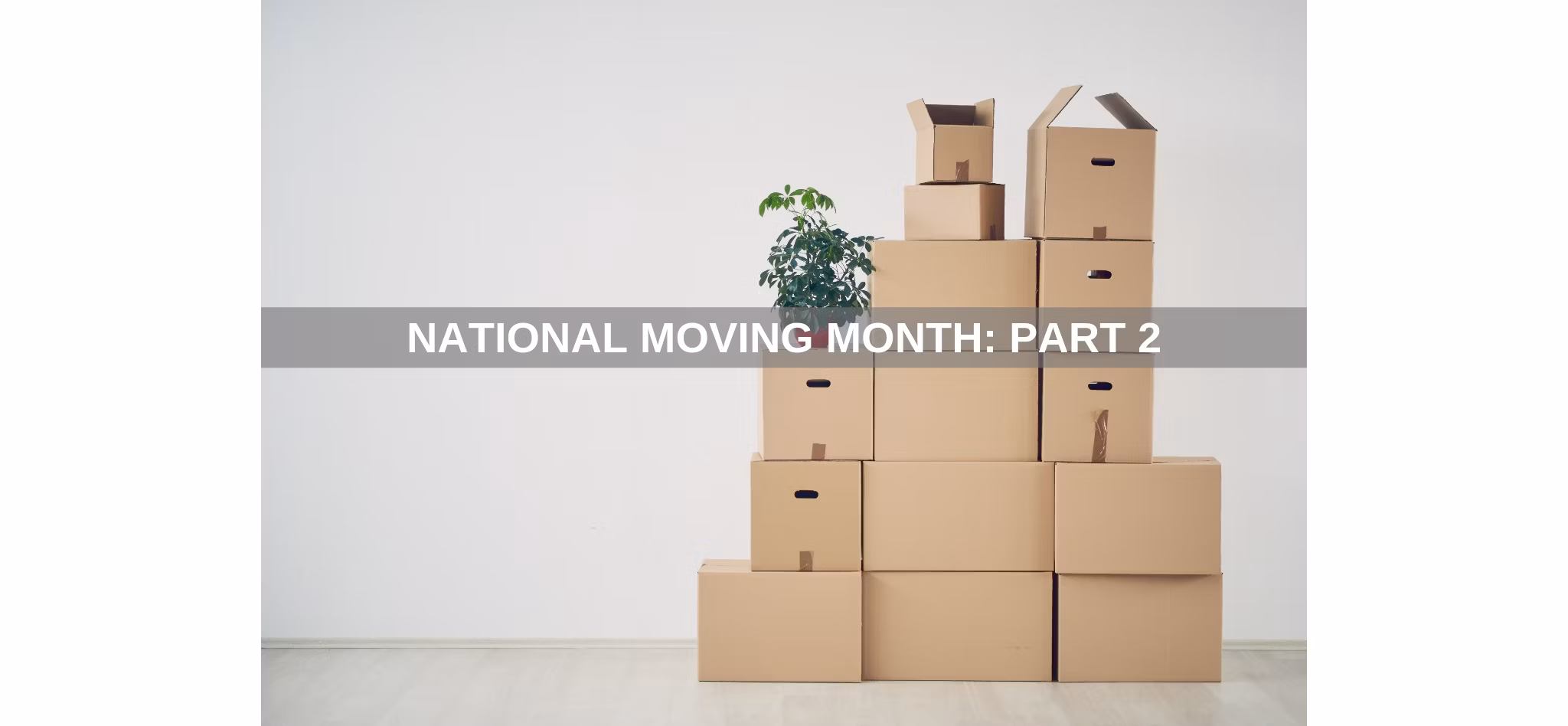  Piled cardboard boxes against a white brick wall on a wooden floor, with the text 'National Moving Month: Part 3'.