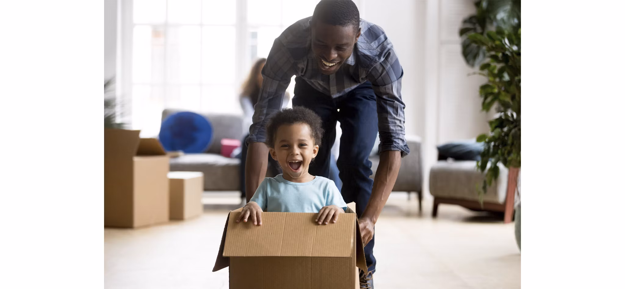 Man and child relocating | Blog | Greystar