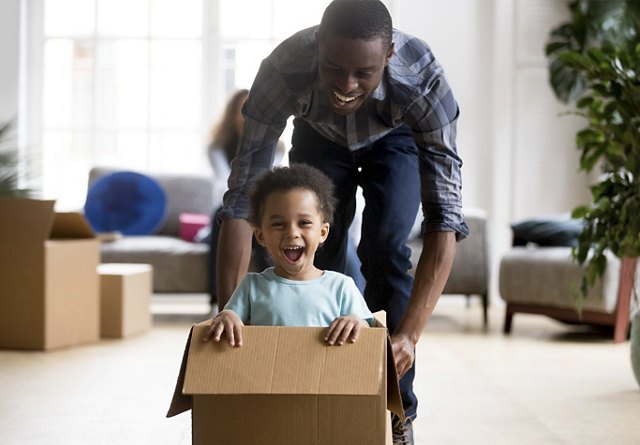 Man and child relocating | Blog | Greystar