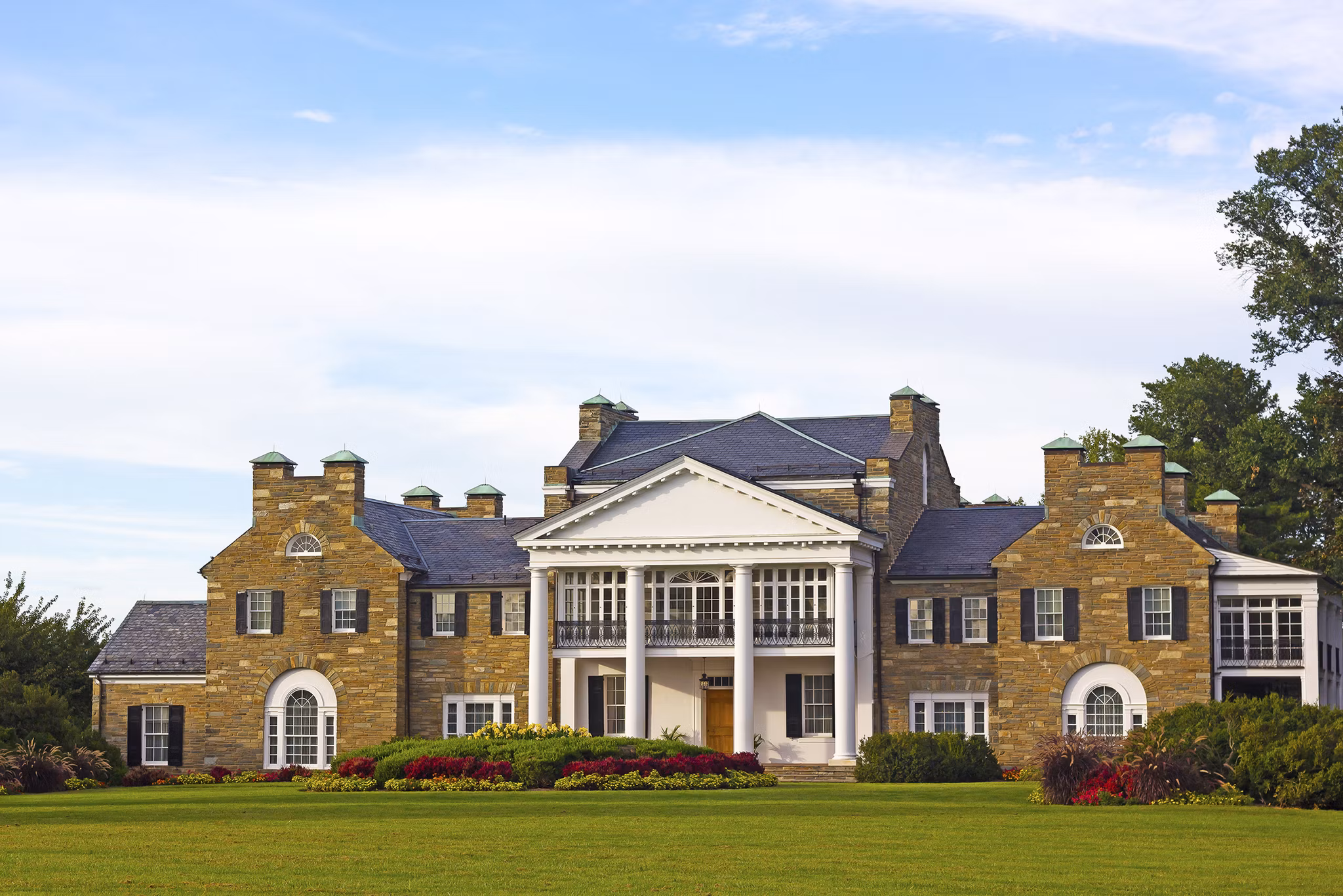 Glenview historic mansion with formal gardens at sunset. Historic Mansion at Civic Center Park in Rockville, Maryland, USA
