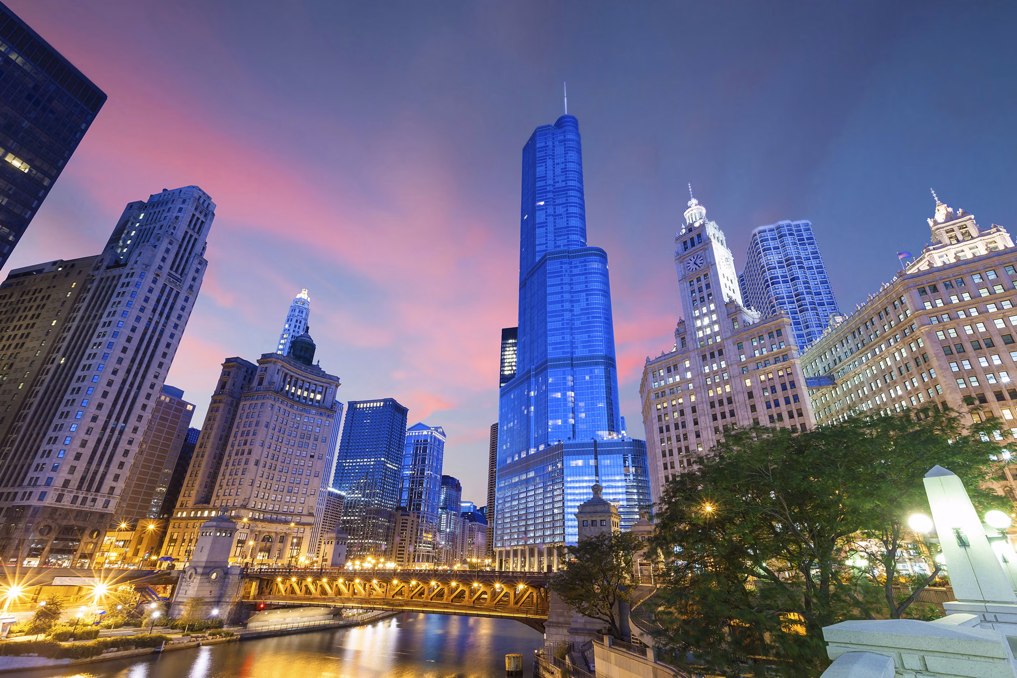 City of Chicago. Image of Chicago downtown and Chicago River with bridges at twilight.