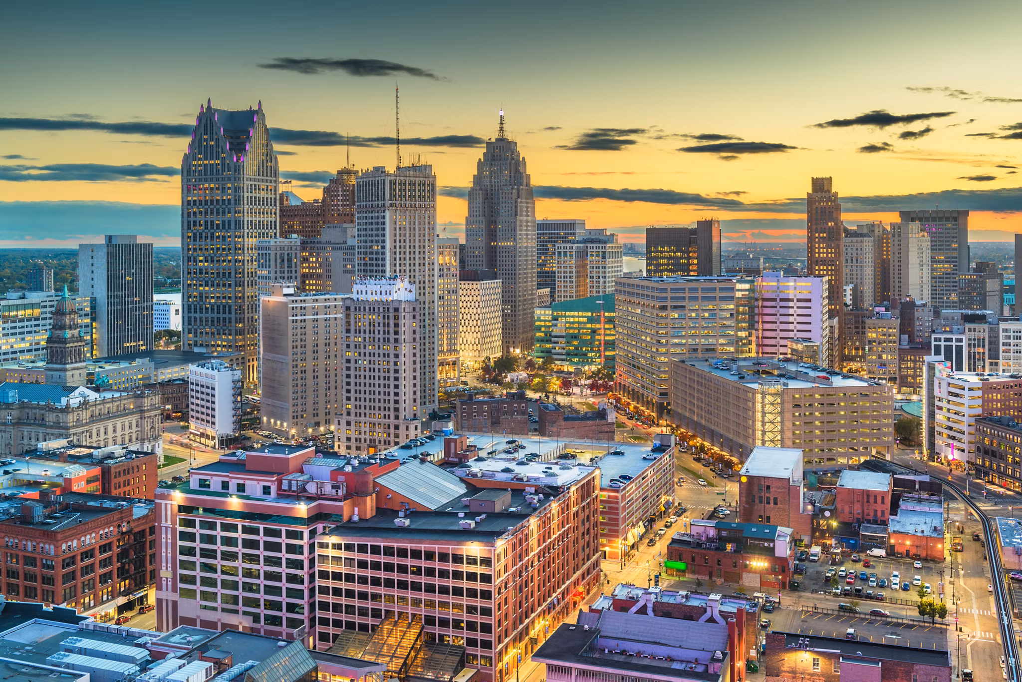 Detroit, Michigan, USA downtown skyline from above at dusk.